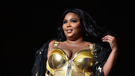 Lizzo Reveals Eerily Realistic Rose Quartz Manicure With Gel Extensions