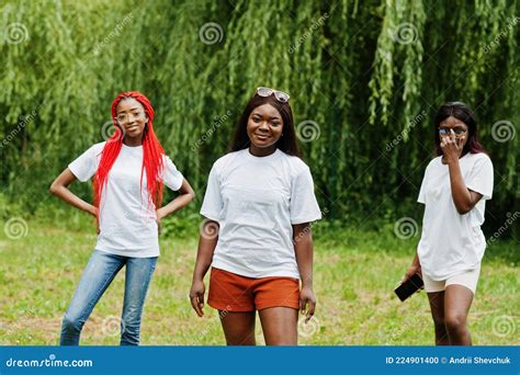 Three African American Womans In Park At White T Shirts Stock Photo Image Of Grass Laughing
