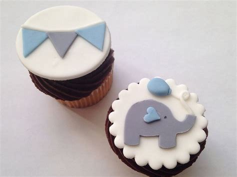 While baby shower cakes are beautiful, there are other simple ways to incorporate your theme by using the same color scheme. Elephant and Bunting Fondant Topper | Baby shower cupcakes for boy, Elephant baby shower cake ...
