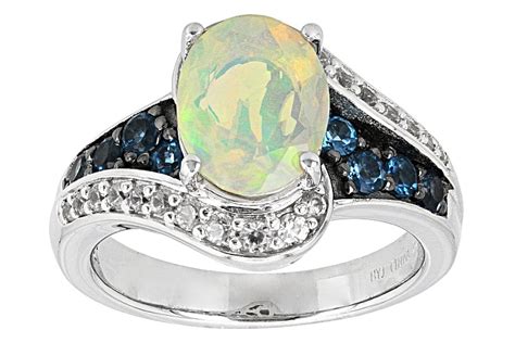 93ct Oval Ethiopian Opal 30ctw London Blue Topaz And 27ctw White