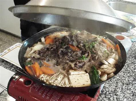 Beef bulgogi, bulgogi, bulgogi image, bulgogi photo, bulgogi recipe, 불고기, korean bbq, korean cooking, korean cuisine, korean food, korean food image, korean recipes, maangchi's. Barbecued beef stew (Bulgogi-jungol) recipe - Maangchi.com