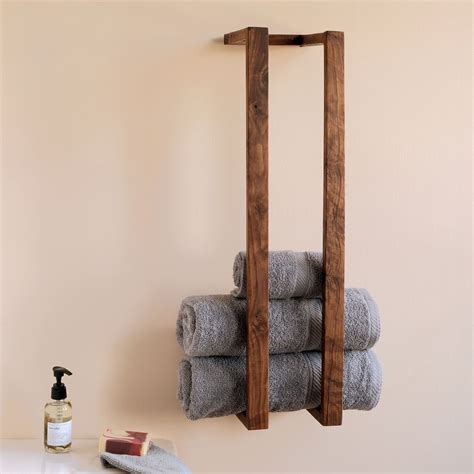 This Modern Wooden Bathroom Rack Can Hold Several Towels And Doubles As