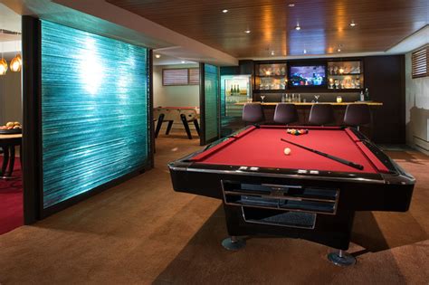 We highly recommend your group be from your own household, or a closed social circle. Wine Cellar and Gaming Room - Contemporary - Family Room ...