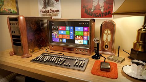 A Computer Monitor Sitting On Top Of A Wooden Desk Next To A Keyboard