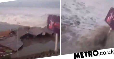 Devastating Moment Tsunami Crashes Into Coastal City In Indonesia