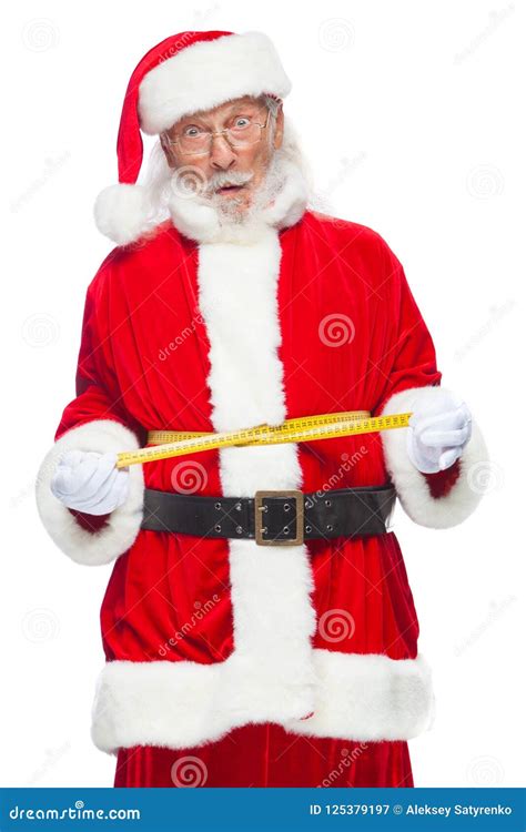 Christmas Santa Claus Is Measuring Waist With A Tape The Concept Of