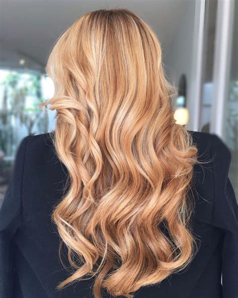 Highlights give long, blonde hair a multifaceted appearance and help it to catch the light, whether you're eating dinner by the fire or stepping outside for a morning stroll. 30 Trendy Strawberry Blonde Hair Colors & Styles for 2020 ...