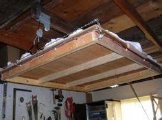 It provides a clever, innovative way to hang light to medium items directly from your garage ceiling and then lower them down when necessary. diy pulley lift platform - Google Search Simple system for ...