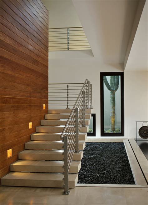 Modern designs of stairs in the living room. Modern Staircase