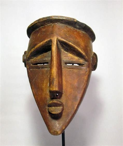 Carved Wooden Mask With Wonderful Sharp Angles And Abstract Features