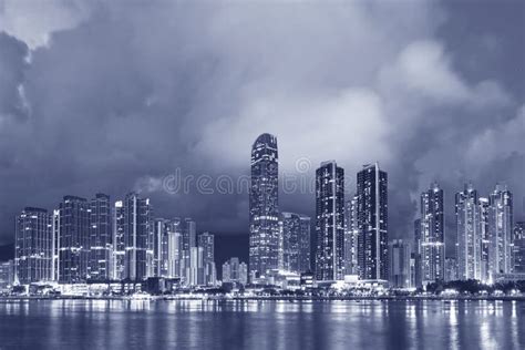 Panorama Of Skyline And Harbor Of Midtown Of Hong Kong City At Dusk