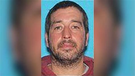 Arrest warrant issued for suspect after 18 killed in shooting rampage