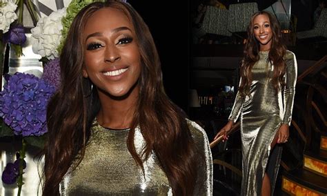 alexandra burke dazzles in figure hugging metallic gown with racy thigh high split daily mail