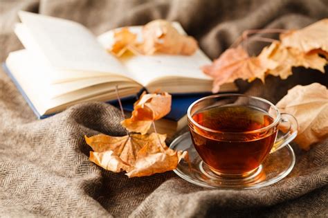Premium Photo Tea Cup On The Fall With Fallen Leaves Next To It