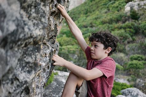 Boy Rock Climbing Del Colaborador De Stocksy Bruce And Rebecca Meissner Stocksy