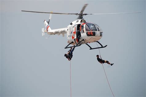 Rappel Down A Helicopter Its One Of Coast Guards Rescue Flickr