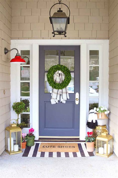 Add a contemporary wreath and flank your door with matching planters. Doormat Layering Guide - Modern Glam - Interiors