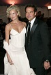 Sarah Murdoch stuns in a white dress as she and husband Lachlan ...