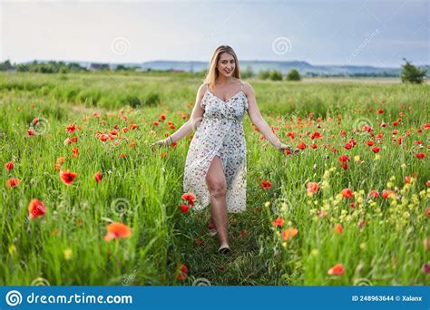 Beautiful Plus Size Woman In A Poppy Field Stock Photo Image Of Bloom