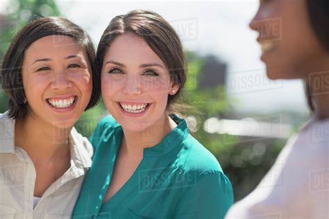 Women Laughing Outside Stock Photo Dissolve