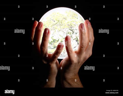 Hands Holding Crystal Ball Hi Res Stock Photography And Images Alamy