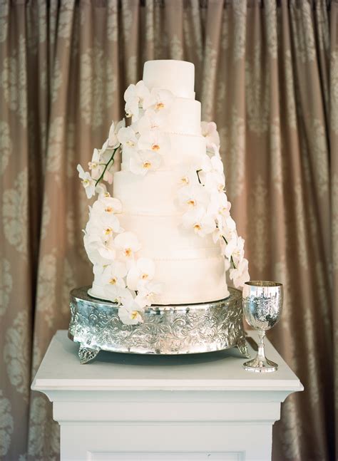 white wedding cake with white orchid cascade orchid wedding cake wedding cakes creative