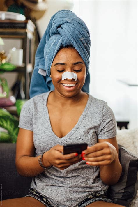 Black Woman At Home Wearing A Nose Strip By Jayme Burrows