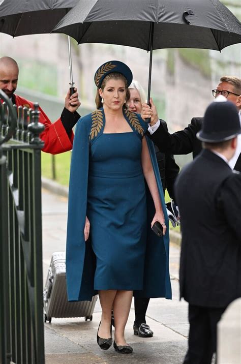 Penny Mordaunt Stuns In Teal Cape As She Wields Huge Jewelled Sword Uk