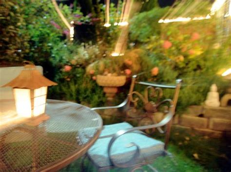 Lights Patio Table Flowers Lamp Chair Night A Garden For The Buddha Seattle Washington