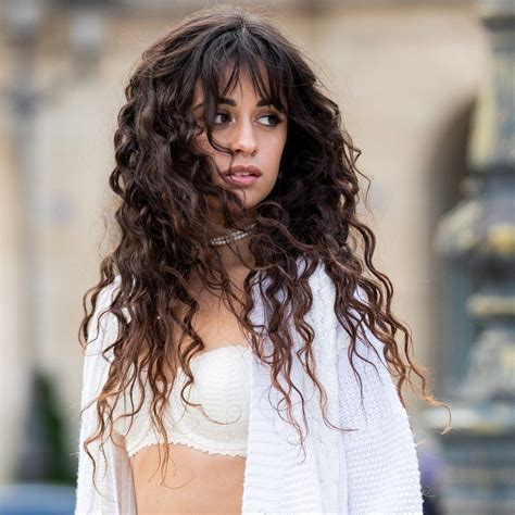 camila cabello says her curly hair is a perm allure colored curly hair curly hair with bangs
