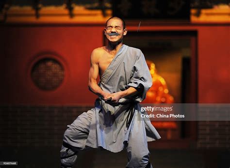 A Monk Performs Shaolin Kung Fu At The Shaolin Temple On October 31