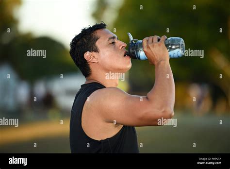 Sport Man Drink Water After Workout In Park Stock Photo Alamy