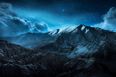 Beautiful Landscape Snow Mountains At Night On Blue Cloud And Star