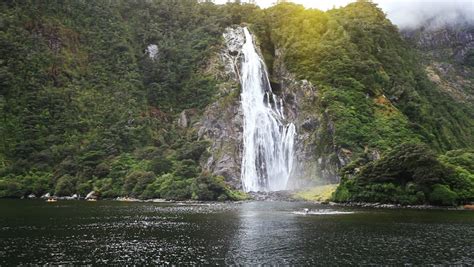 View On Lady Bowen Falls From Boat Milford Sound Fjord
