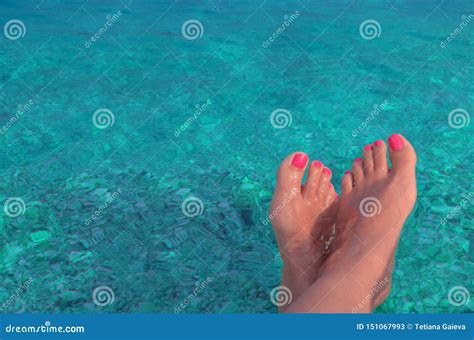 A Pair Of Female Legs On A Background Of Blue Water Stock Image Image Of Dipping Closeup