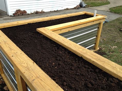 Containers on wheels are the perfect raised garden beds for renters, thanks to the portability. Building a Self Watering Raised Garden Bed - Frugal Living