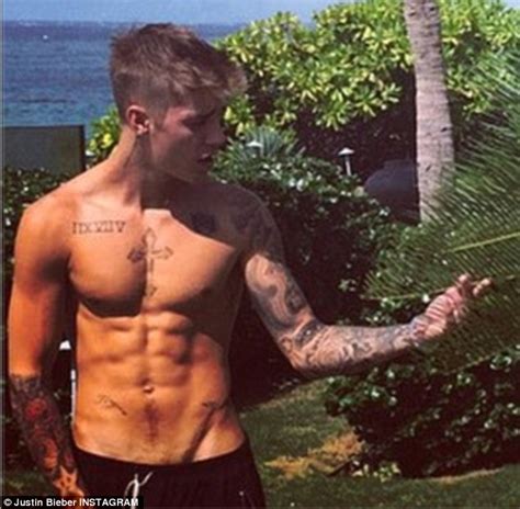 justin bieber posts tender picture of himself with selena gomez before showing off his six pack