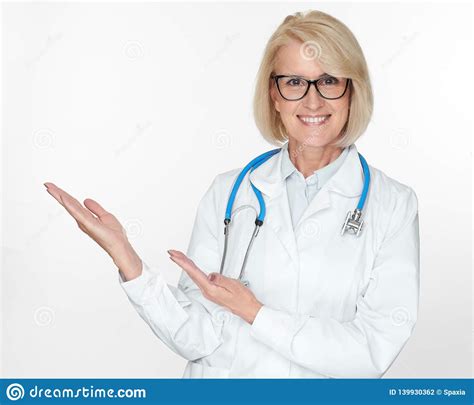 Old female doctor stock photo. Image of confident, prescription - 139930362