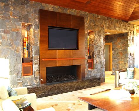 If your fireplace is in need of a facelift, a few updates can transform a lackluster these remarkable fireplace makeovers and remodels feature new mantels, fabulous surrounds, and cozy hearths. Metalwork: Bronzed Metal Fireplace Surround - Contemporary ...