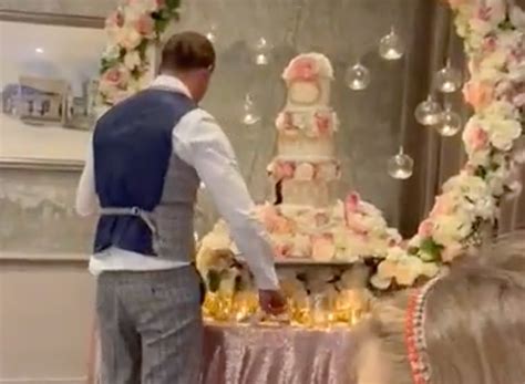video shows groom smashing wedding cake in face of new wife