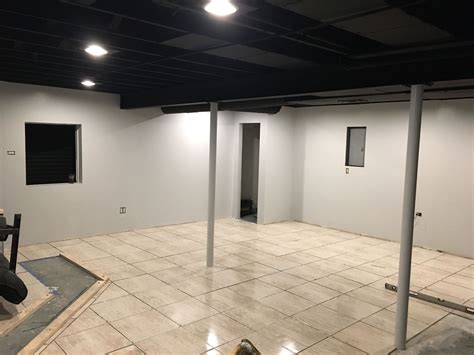 Paint the walls white, put dark floor and paint the ceiling black, you will get awesome combination. Exposed black dryfall basement ceiling, finishing basement ...