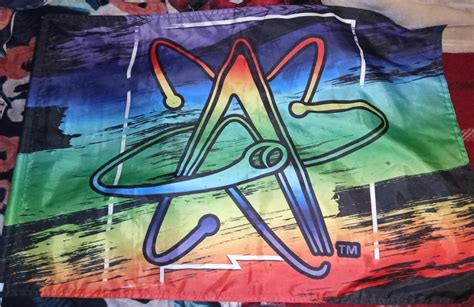 My brothers gave me these Pride Flags from a couple of our local sports