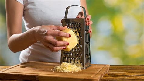 Best Grating Cheese Stock Photos Pictures And Royalty Free Images Istock