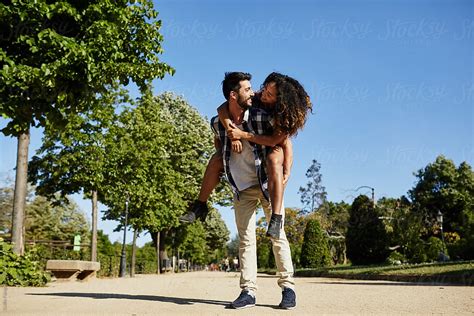Happy Couple In Park By Stocksy Contributor Guille Faingold Stocksy