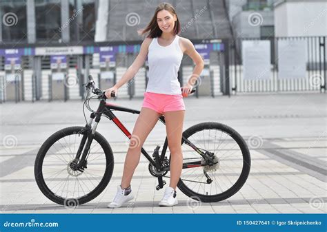 beautiful girl having bike telegraph