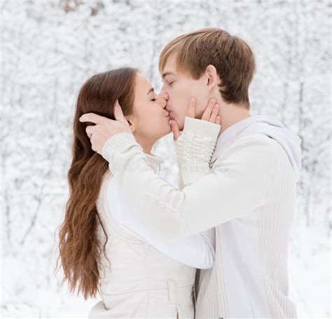 Young Couple Kissing In Winter Forest Stock Image Image Of Love Handsome 61980291