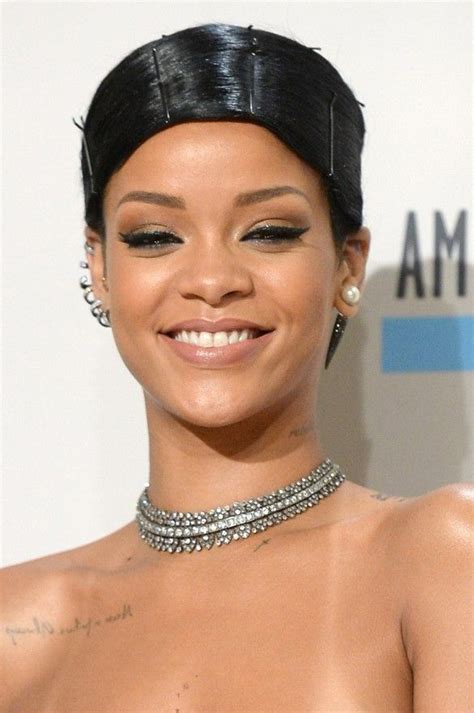 Rihanna Wears Ear Cuffs And A Spiked Pearl Earring With A Crystal