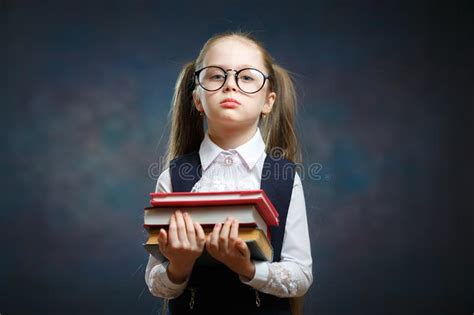 Serious Schoolgirl Wear Glasses Hold Pile Of Book Stock Photo Image