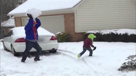 Dad Throws Giant Snowball At Kid Snowball Real Funny Videos Kid Memes