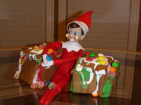 Elf Eating A Gingerbread House Elf Elf On The Shelf Christmas Elf
